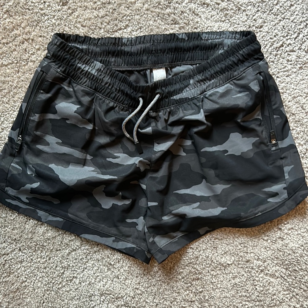 Athleta Girl black camo shorts.